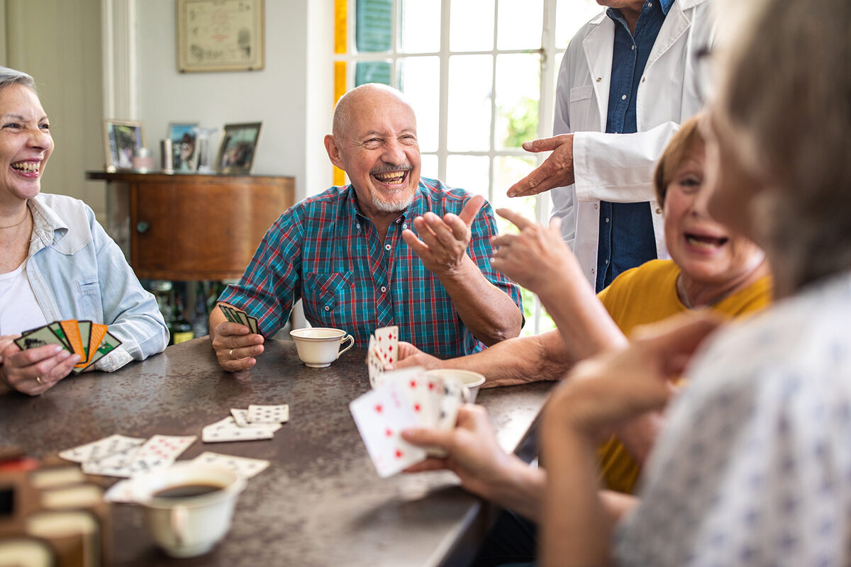 Enjoying their card game in nursing home